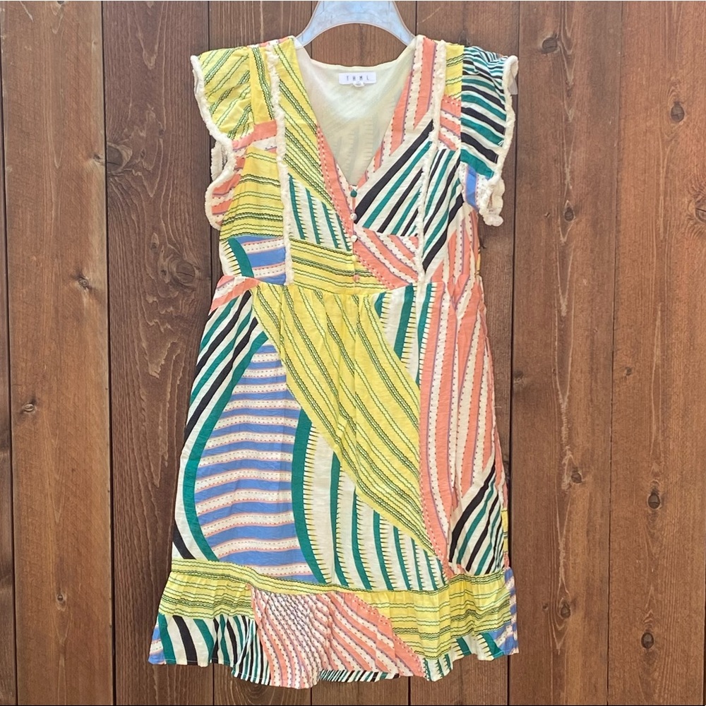 THML sundress; muted neon colors, fun pattern and fringe